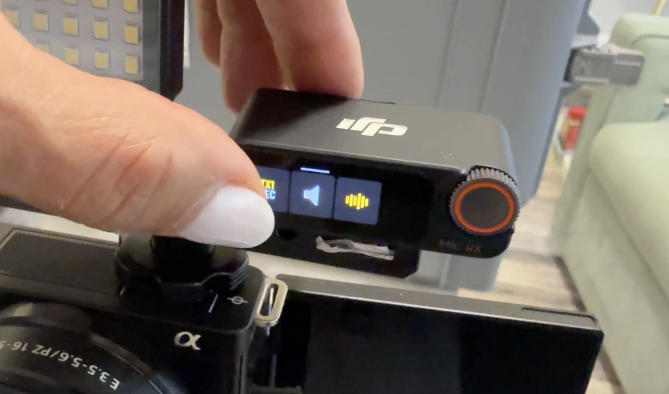 Flip up the DJI receiver to record